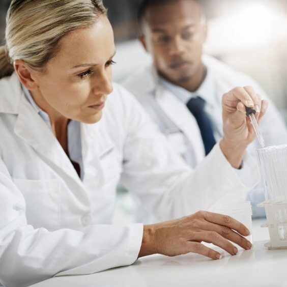 lets-test-these-samples-cropped-shot-two-scientists-testing-sample-while-doing-research-their-lab 1